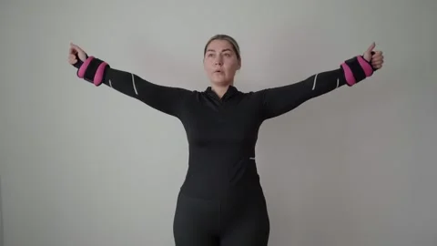 Home Shoulder Mobility Arm Raises with Wrist Weights for Beginners Stock Footage 340544955