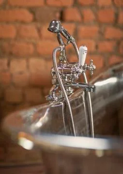 Home showcase interior stainless steel soaking tub faucet Stock Photos