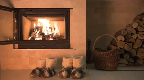 Home slippers by the fire Stock Footage 58894498