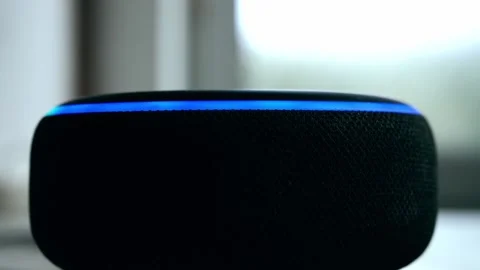 Home smart voice device in home lighting up Stock Footage 221858967
