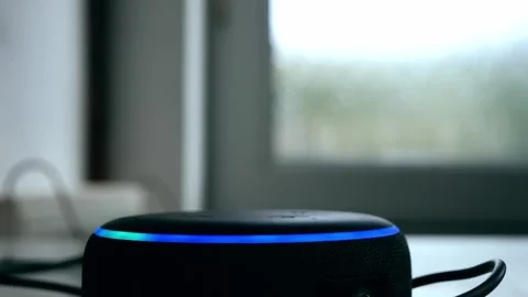 Home smart voice device in home lighting up Stock Footage 224140547