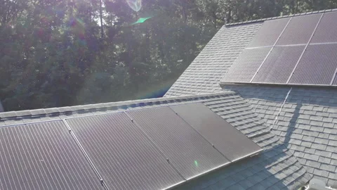 Home solar panels in the sun Stock Footage