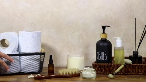 Home Spa Essentials On Bathroom Shelf With Towels, Oils, Pump Bottle, Diffuser S Stock Footage 327730955