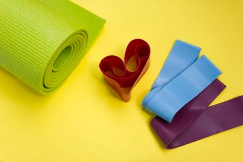 Home sports equipment. Fitness and pilates gum. Pilates equipment flatly. Ela Stock Photos