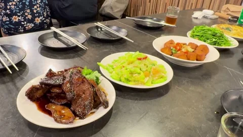 Home-Style Taiwanese Dinner Table with Multiple Shared Dishes Stock Footage 341452584