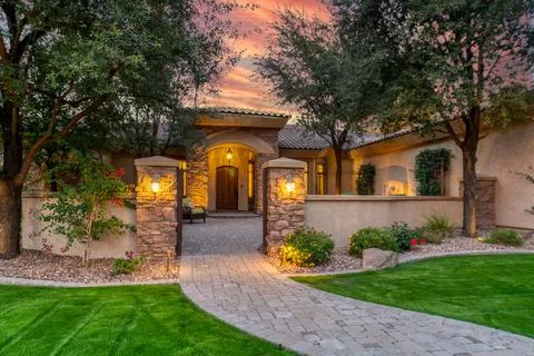 A home at sunset Stock Photos