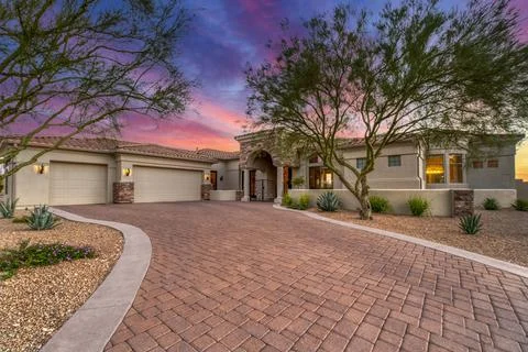 A home at sunset Stock Photos