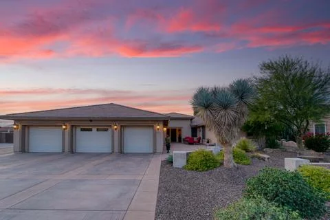 A home at sunset Stock Photos