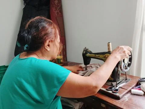 Home tailor Stock Photos