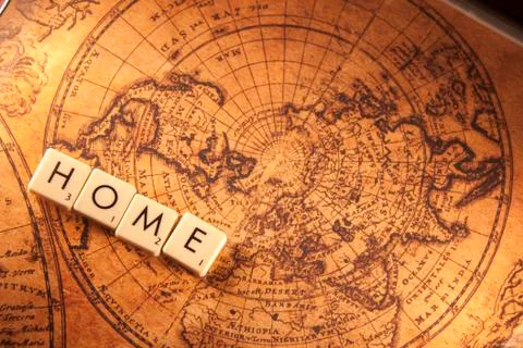Home text on a world map Stock Photos