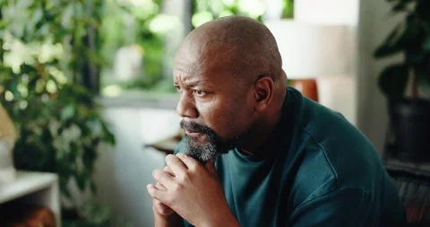 Home, thinking and black man frustrated with reflection, decision and sad with Stock Footage 323369407