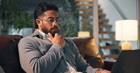 Home, thinking and man on sofa, laptop and copywriting with problem solving Stock Footage 314033009
