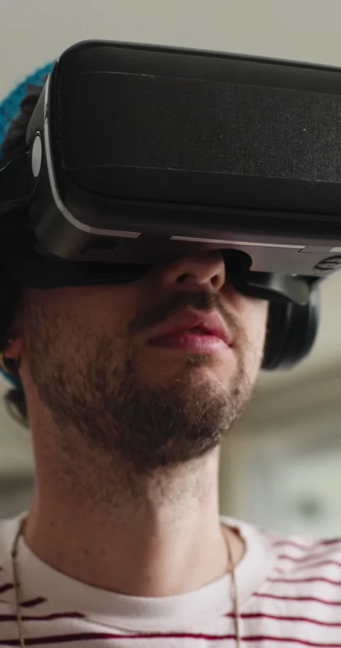 Home, touch and man with virtual reality glasses for cyberspace, metaverse and Stock Footage 332985045