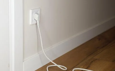 Home white plug in socket electric energy Foto stock