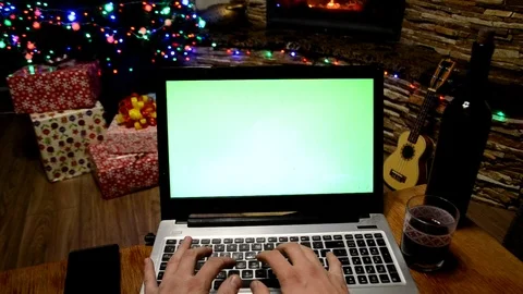 Home working notebook with Christmas background Stock Footage 99490934