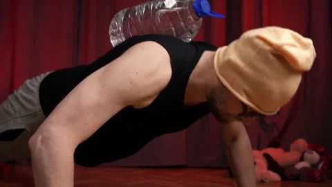 Home Workout.Man fails when trying to doing Push-ups. Stock Footage 131095871