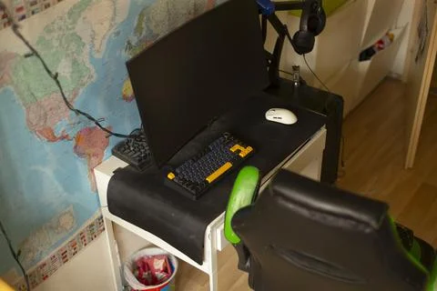 Home workspace setup. Home studio with gaming and travel elements Stockfoto's