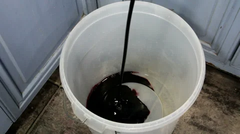 Homebrew wine  kit - adding grape juice concentrate Stock Footage 36114549