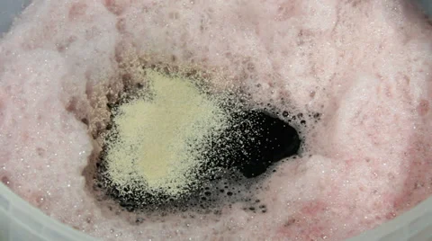 Homebrew wine  kit - adding the yeast Video stock 35796326