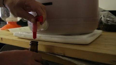 Homebrewing, fill the bottles Stock Footage 76325297