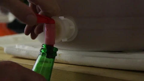 Homebrewing, fill the bottles Stock Footage 76346909