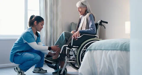 Homecare, caregiver and help old woman in wheelchair for mobility support, safe Stock Footage 340740853
