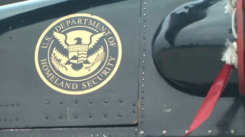 Homeland Security logo on the side of a US Customs Border Protection Helicopter Stock Footage 39824626