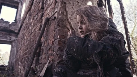 A homeless child on the ruins. Refugee. Stock Footage