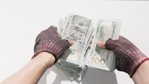 Homeless counting US dollar bills indoors Stock Footage 335817202