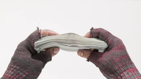 Homeless hands holding US dollar banknotes on white background Stock Footage 331197542