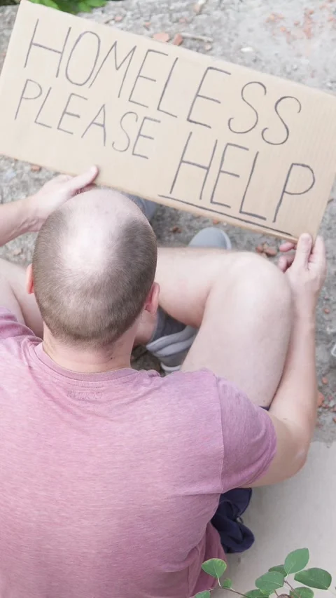 A homeless man asks for help in the form of alms. 스톡 동영상 306291360