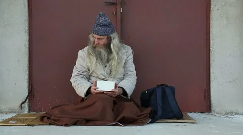 Homeless man begging Stock Footage 56710532