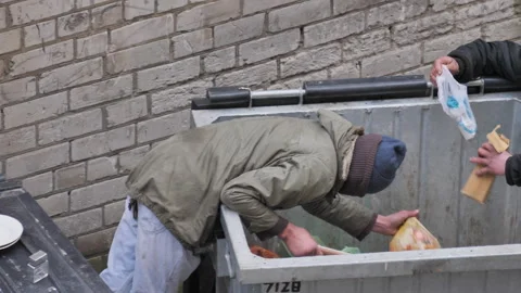 Homeless Man Digging Through Trash Can Stock Footage 265253385