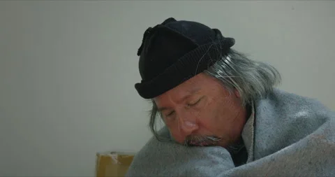 Homeless man is feeling cold at the outside and begging for money Stock Footage 202780067