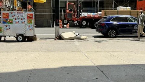 Homeless man on Fifth Ave 写真素材