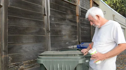 Homeless man going through garbage Stock Footage 42809642