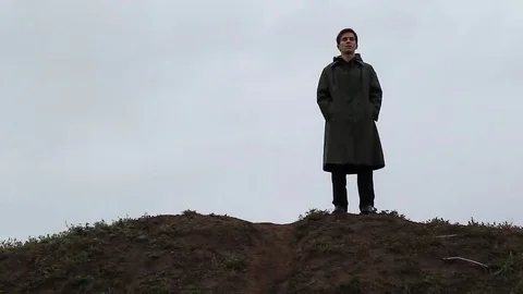 Homeless man on a hill Stock Footage 69101834