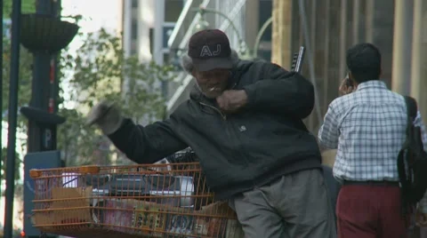 Homeless man in NYC having a smoke Stock Footage
