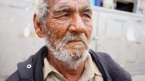 A homeless man poses for the camera in small town in Mexico Stock Footage 42405264