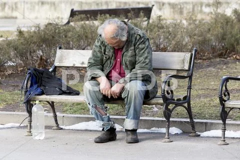 Homeless Man Sleeping On A Bench Stock Images Page Everypixel