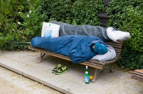 Homeless man sleeping Stock Photos