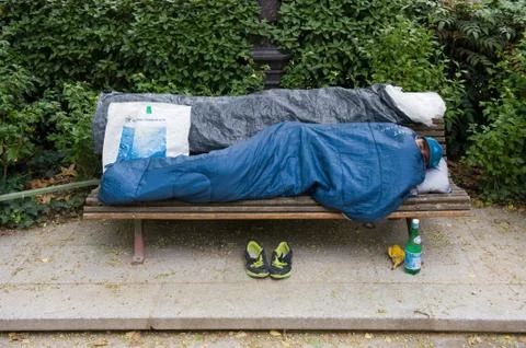 Homeless man sleeping Stock Photos