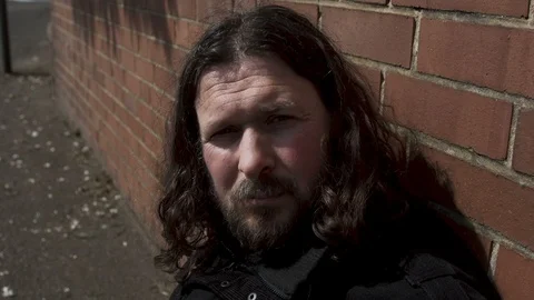 Homeless Man Stares up to Camera Stock Footage 88360346