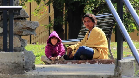 Homeless mother and child begging Stock Footage