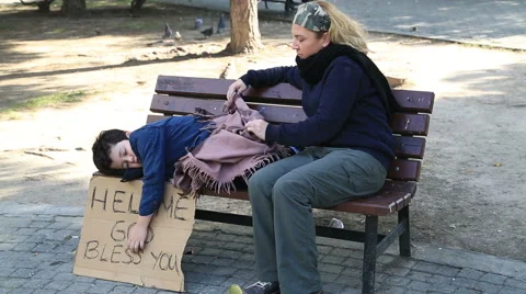 Homeless mother and son Stock Footage