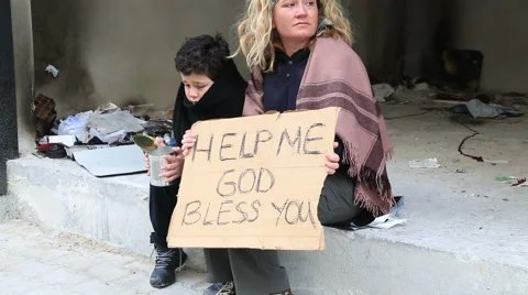 Homeless mother with her son Stock Footage