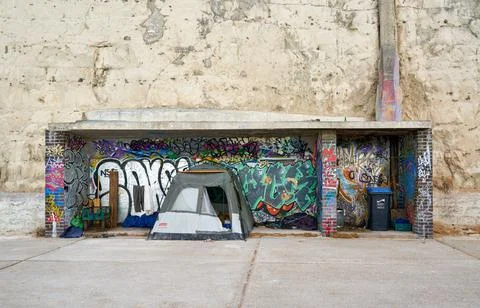 Homeless people living in tents in the sea shelters in Ramsgate city Stock Photos