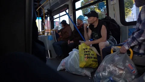 Homeless People Ride the Bus to Bottle Depot in Vancouver, BC Stock Footage