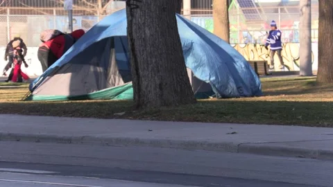 Homeless people sleep in tents during CO... | Stock Video | Pond5