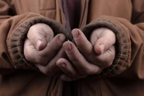 Homeless poor beggar asks for help ,unemployed in despair Stock Photos